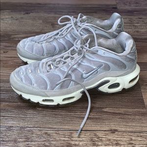 Grey Nike suede sneakers